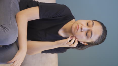 Vertical-video-of-Sad-and-nervous-young-woman.